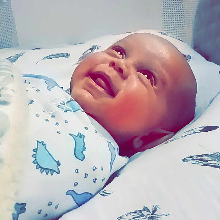 Azir is registered to the contest to win money with this photo: baby, babylaughing, bed, bedroom, blanket, crying, cushion, face, furniture, happy, head, homedecor, indoors, newborn, person, photography, portrait, room, sad, smile