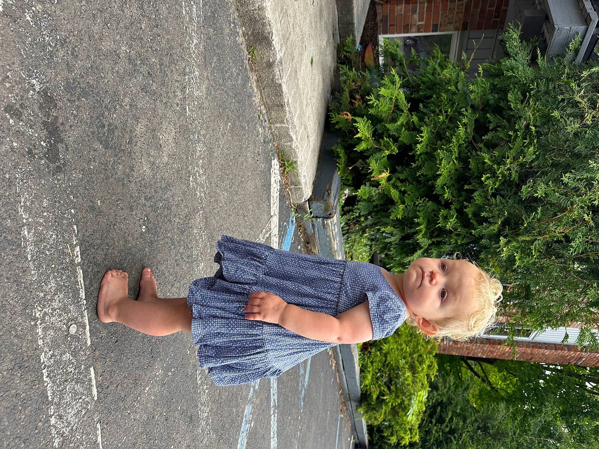 Violette joined the competition — help win amazing prizes! arm, asphalt, barefoot, child, denim, foot, fun, grass, happy, human_leg, leisure, people_in_nature, person, plant, road_surface, sidewalk, sitting, smile, thigh, toddler