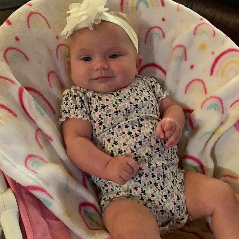 Kobe is registered to the contest to win money with this photo: baby, bed, bonnet, cap, clothing, couch, crib, cushion, dress, face, furniture, hat, head, homedecor, infantbed, newborn, person, photography, portrait, sleeping