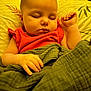 Ivory joined the competition — help win amazing prizes! baby, sleeping, blanket, pillow, red_clothing, hand, face, infant, rest, peaceful, indoors, closeup, skin, cute, child, young, portrait, soft_lighting, fabric, relaxation