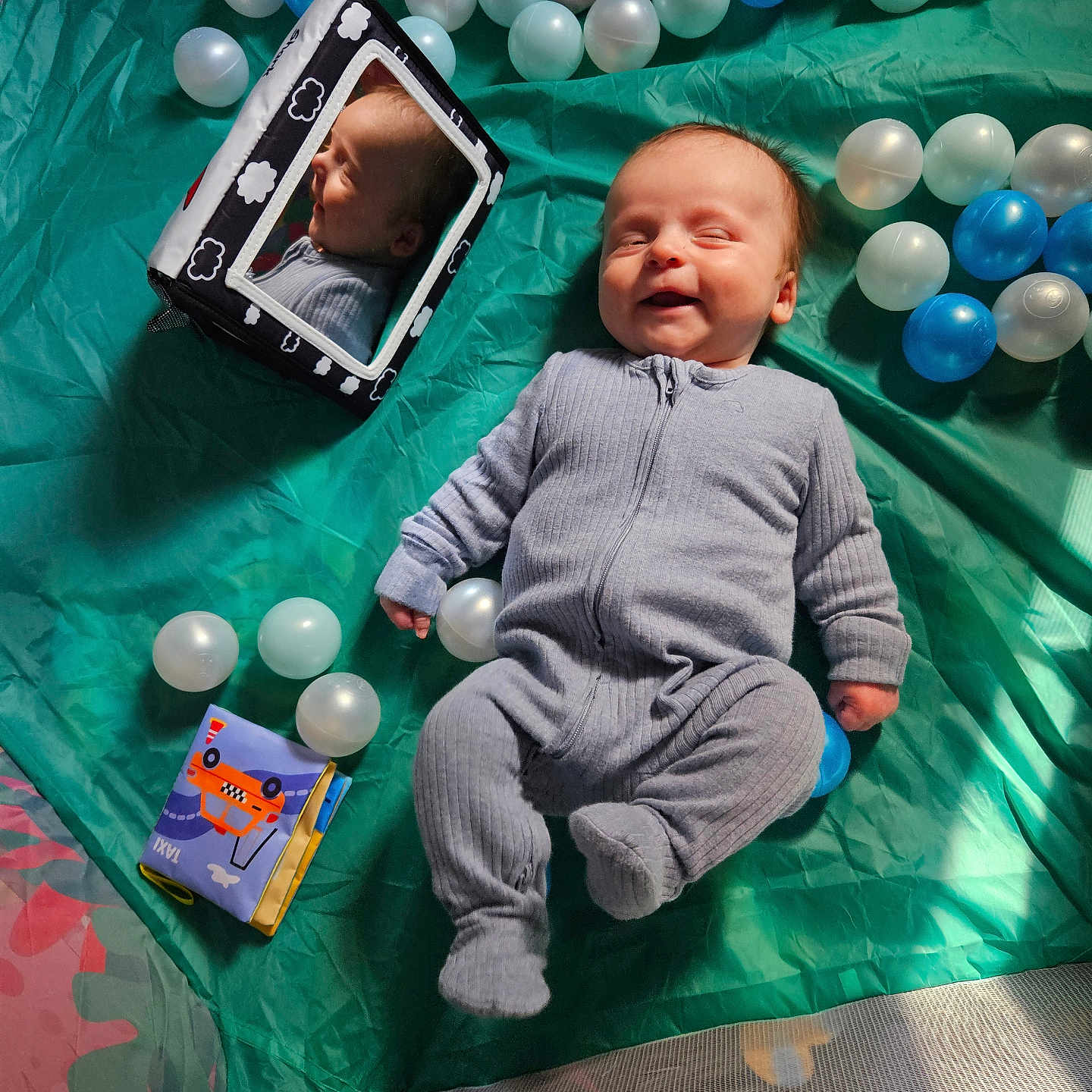 Stanley is registered to the contest to win money with this photo: accessories, architecture, baby, balloon, bed, building, face, furniture, happy, head, jewelry, newborn, outdoors, people, person, photography, portrait, shelter, smile, sphere