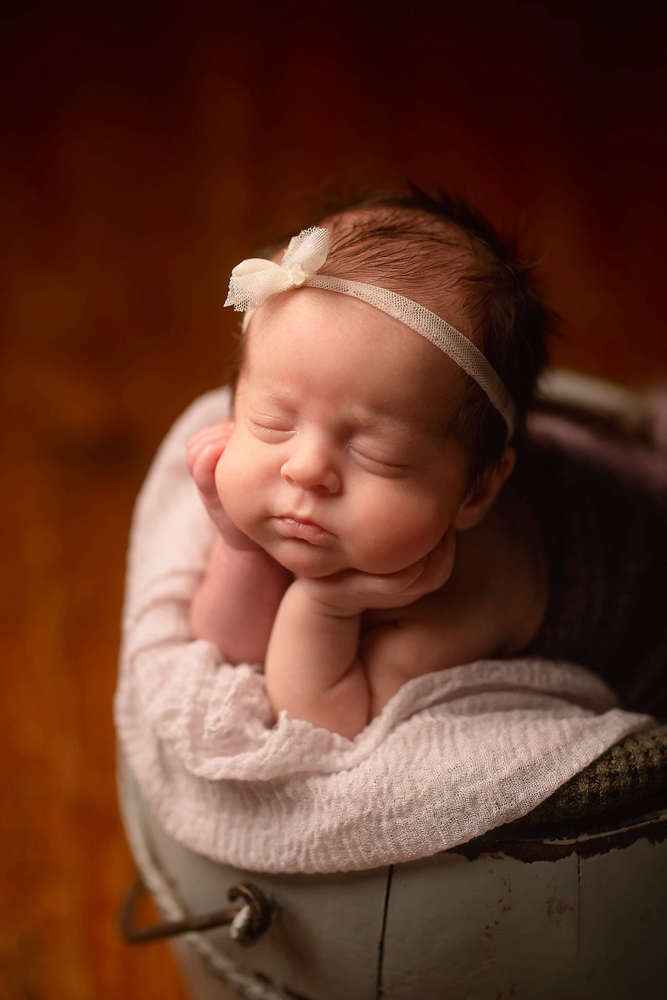 Flora is registered to the contest to win money with this photo: baby, baby_toddler_clothing, cap, cheek, comfort, eye, eyebrow, eyelash, fashion_accessory, flash_photography, happy, headband, headpiece, iris, lip, peach, person, portrait_photography, sitting, toddler