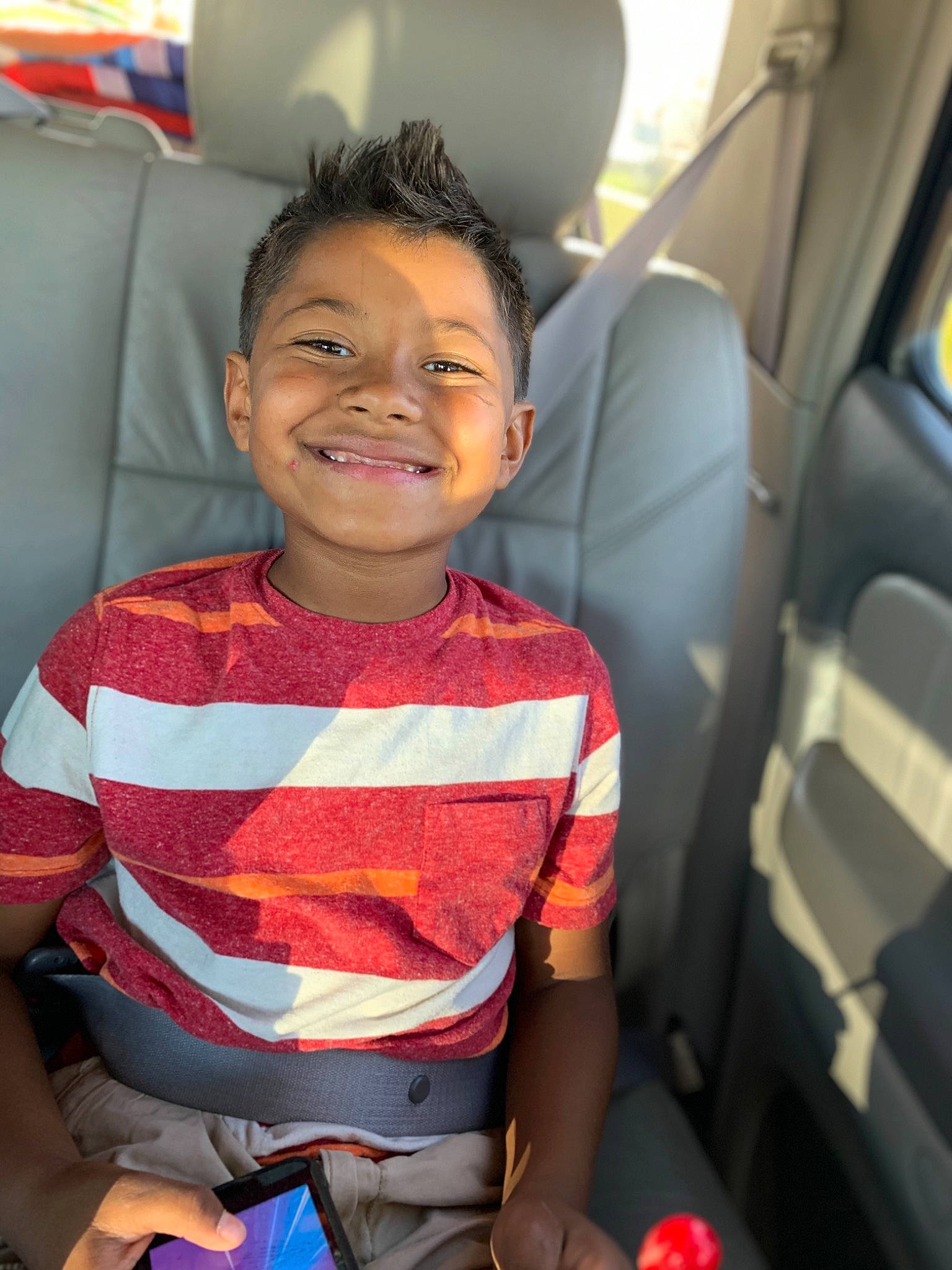 Dwayne joined the competition — help win amazing prizes! auto_part, car, car_seat, child, family_car, joy, passenger, person, seat_belt, smile, toddler, vacation, vehicle