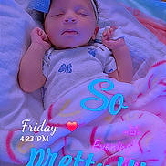 Harlow is registered to the contest to win money with this photo: baby, sleeping, blanket, bow, crib, infant, headband, clothing, cute, peaceful, resting, soft, colorful, indoors, child, portrait, toddler, cozy, love, heart