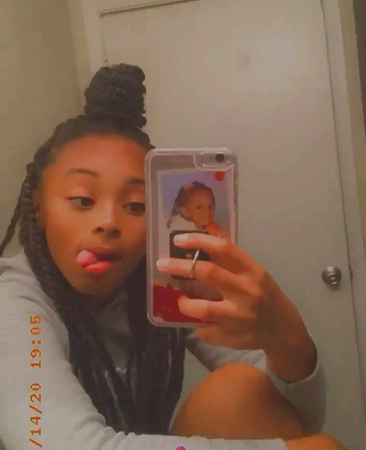 Jada is registered to the contest to win money with this photo: black_hair, chest, communication_device, electronic_device, eyebrow, eyelash, finger, gadget, gesture, lip, long_hair, mirror, mobile_phone, neck, person, portable_communications_device, selfie, surprise, telephone, telephony