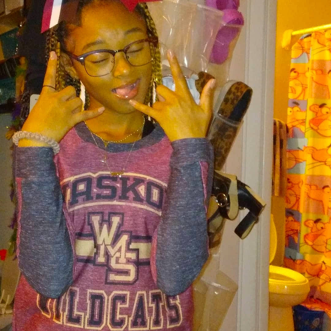 Jada joined the competition — help win amazing prizes! arm, beauty, cool, eyewear, fashion_design, fun, gesture, glasses, glove, hairstyle, happy, headgear, jersey, magenta, person, pink, sleeve, sportswear, t_shirt, vest