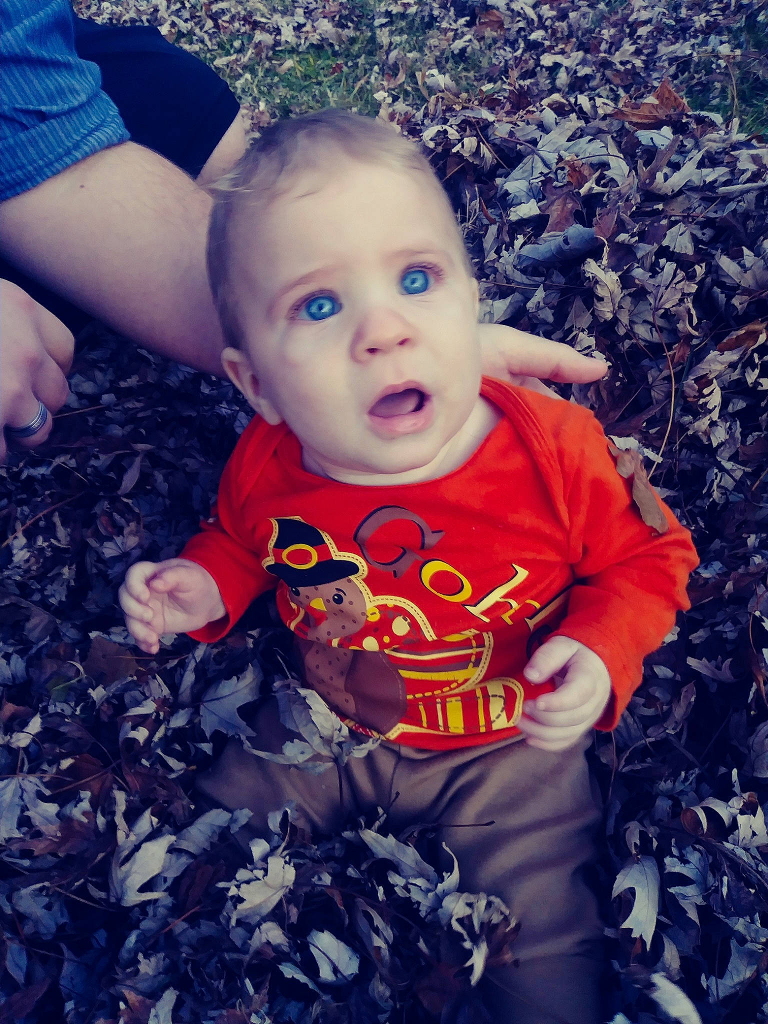 Jackie is registered to the contest to win money with this photo: boy, child, cool, fun, girl, happiness, infant, person, product, red, smile, surprise, toddler