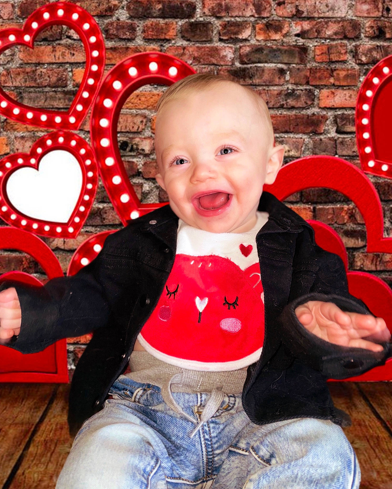 Ryder joined the competition — help win amazing prizes! baby, baby_toddler_clothing, chair, cheek, clothing, eye, facial_expression, fun, happy, head, human_body, jeans, organ, person, red, skin, sleeve, smile, standing, textile