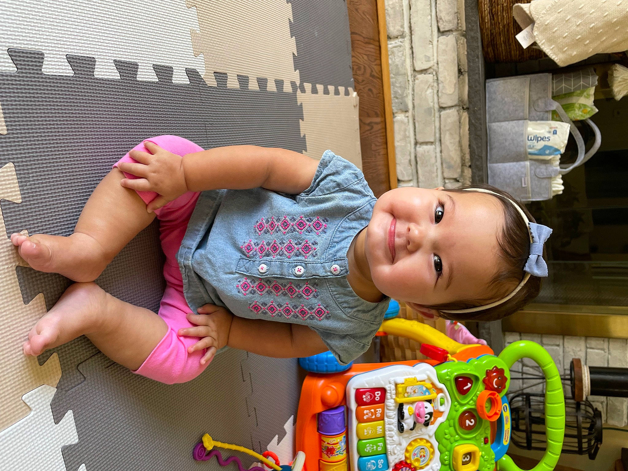 Kennedy joined the competition — help win amazing prizes! baby, baby_products, baby_toddler_clothing, child, foot, fun, happy, hat, human_leg, joy, leisure, pattern, person, play, room, sandal, sitting, smile, sock, thigh