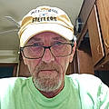 John B.