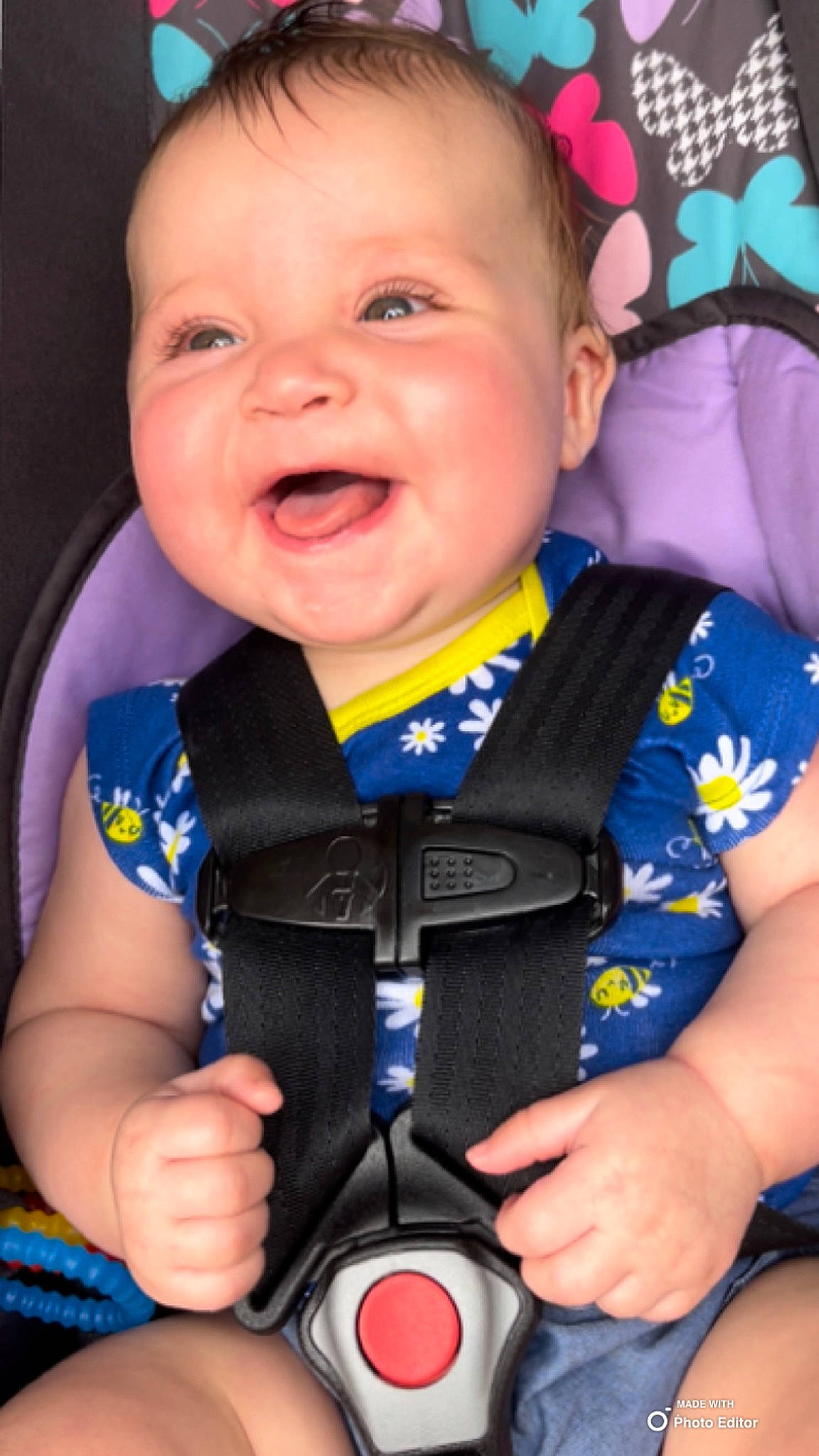 Ebony is registered to the contest to win money with this photo: baby, baby_toddler_clothing, blue, cheek, collar, electric_blue, face, finger, fun, gesture, happy, nose, organ, outerwear, person, product, skin, sleeve, smile, thumb