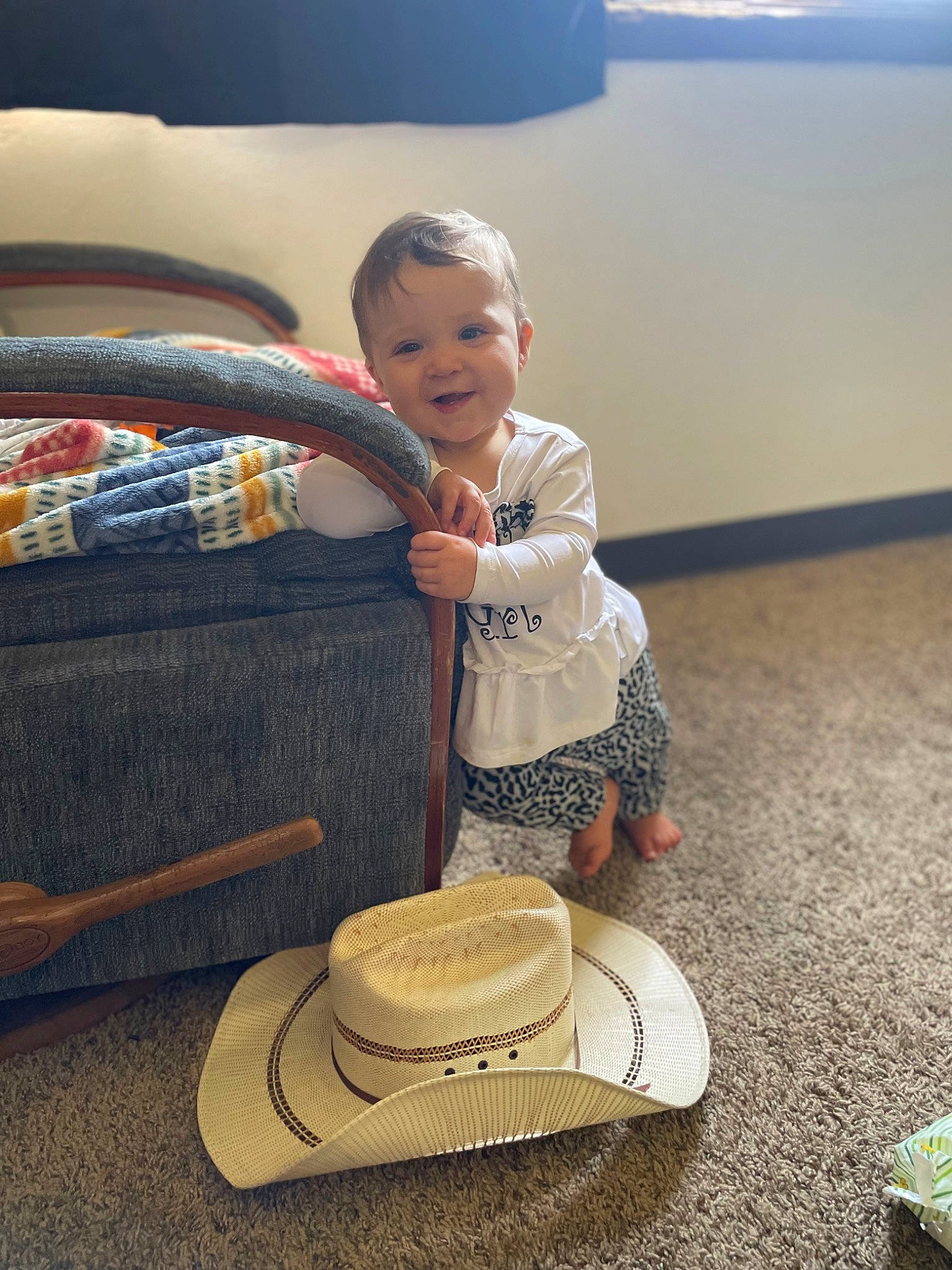 Ebony Hays is registered to the contest to win money with this photo: baby, baby_toddler_clothing, child, circle, comfort, dishware, fashion_accessory, flooring, fun, happy, hat, person, plate, serveware, sitting, smile, sombrero, sun_hat, table, toddler
