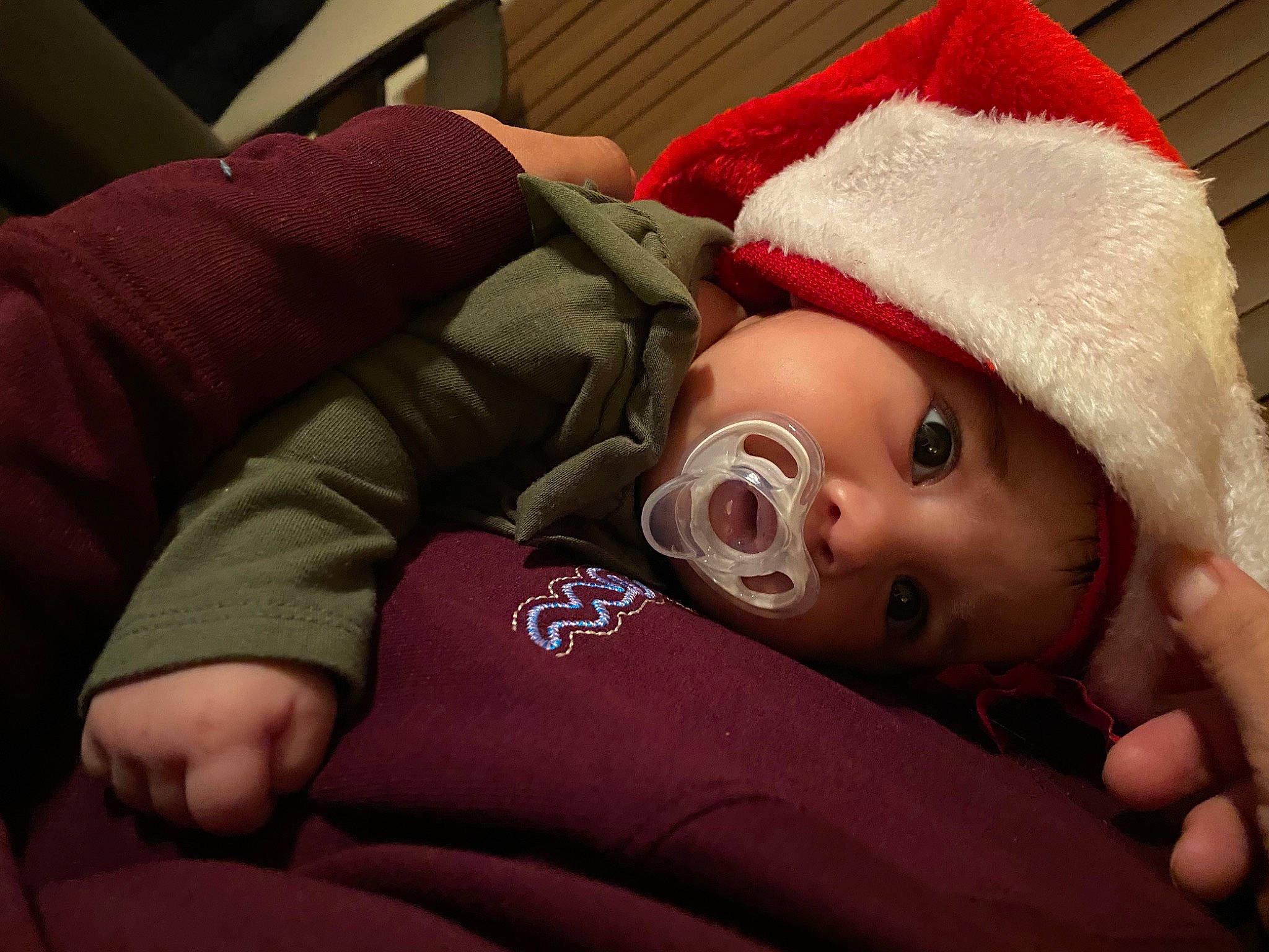 Katalina is registered to the contest to win money with this photo: baby, baby_sleeping, cap, carmine, cheek, child, comfort, costume_hat, eye, fictional_character, fur, fur_clothing, holiday, human_body, nose, room, santa_claus, sleeve, textile, toddler