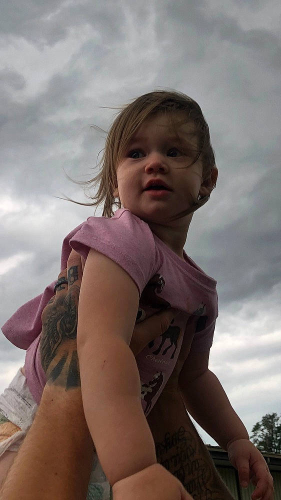 Kimberly is registered to the contest to win money with this photo: baby, chest, cloud, elbow, face, flash_photography, fun, grass, happy, leisure, people_in_nature, person, shoulder, skin, sky, standing, sunlight, toddler, tree, trunk