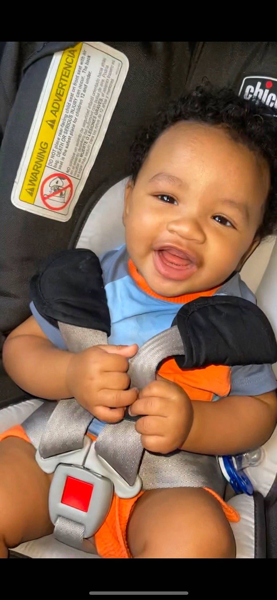 Dreyon is registered to the contest to win money with this photo: arm, baby, baby_in_car_seat, car_seat, cheek, comfort, eye, face, facial_expression, finger, gesture, happy, leg, mouth, nose, person, product, skin, smile, thumb