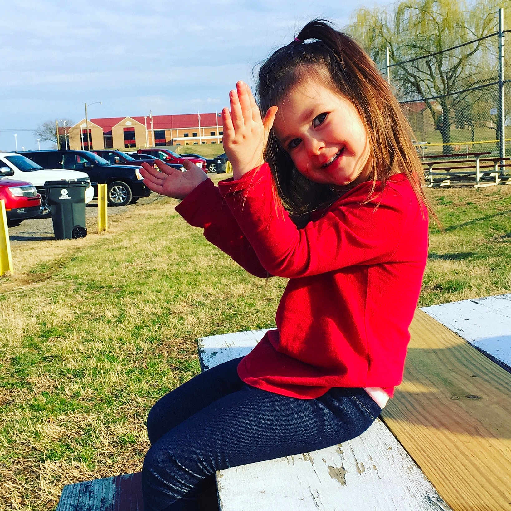 Mikeyla is registered to the contest to win money with this photo: arm, beauty, child, cool, facial_expression, grass, hand, happy, jacket, jeans, joy, long_hair, outerwear, person, photography, recreation, red, sitting, sky, smile
