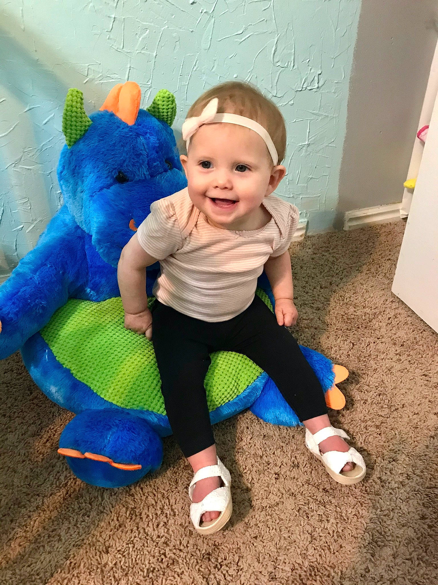 Avalon joined the competition — help win amazing prizes! baby, baby_toddler_clothing, blue, child, fun, happy, head, headwear, joy, person, play, shoe, sitting, skin, sleeve, smile, standing, t_shirt, toddler, turquoise