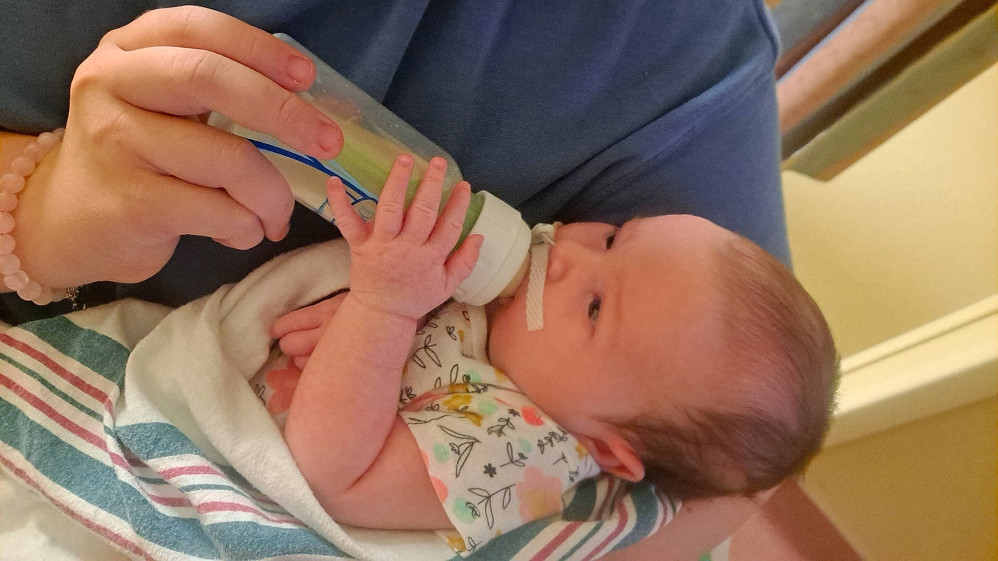 Aurora is registered to the contest to win money with this photo: baby, baby_products, baby_toddler_clothing, cheek, child, comfort, ear, eyelash, finger, gesture, hand, human_body, mouth, nail, neck, nose, person, skin, thumb, toddler