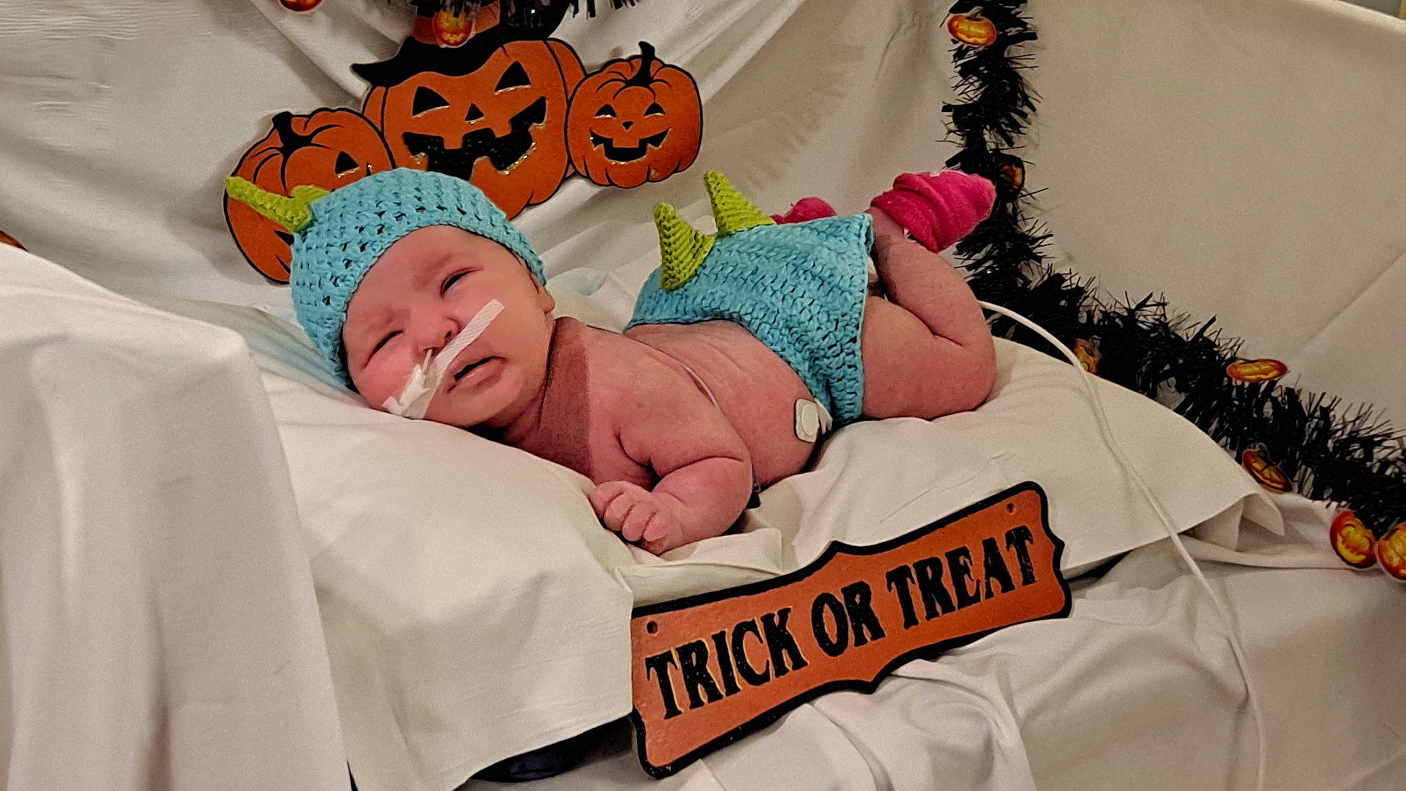 Aurora joined the competition — help win amazing prizes! baby, baby_products, baby_sleeping, baby_toddler_clothing, bedding, bedtime, calabaza, child, comfort, event, font, happy, headwear, icing, linens, person, pumpkin, room, smile, textile