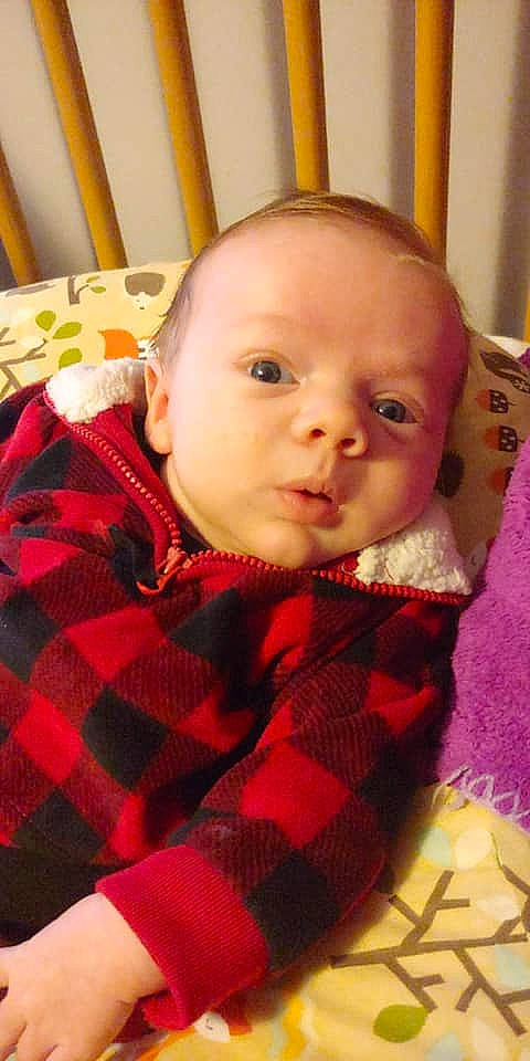 Deacon is registered to the contest to win money with this photo: baby, baby_toddler_clothing, cheek, eyebrow, knitting, linens, lip, pattern, person, plaid, tartan, textile, thread, toddler, wool, woolen