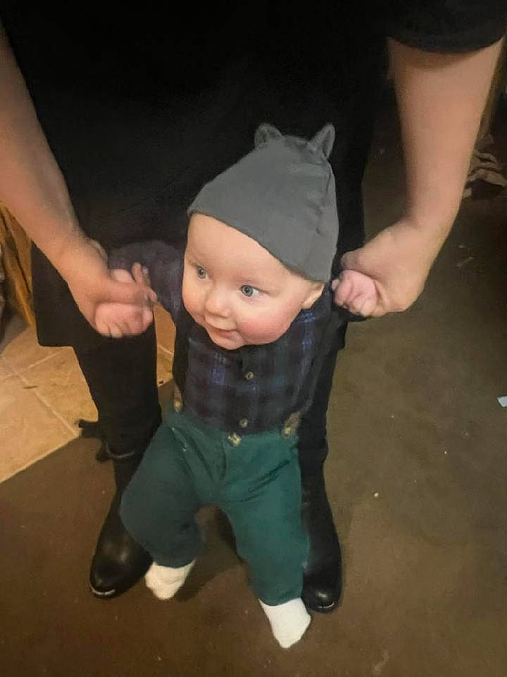 Connor joined the competition — help win amazing prizes! baby, baby_toddler_clothing, cap, cheek, child, eye, flash_photography, flooring, fun, gesture, hat, head, headwear, knee, lap, person, personal_protective_equipment, sitting, sock, thigh
