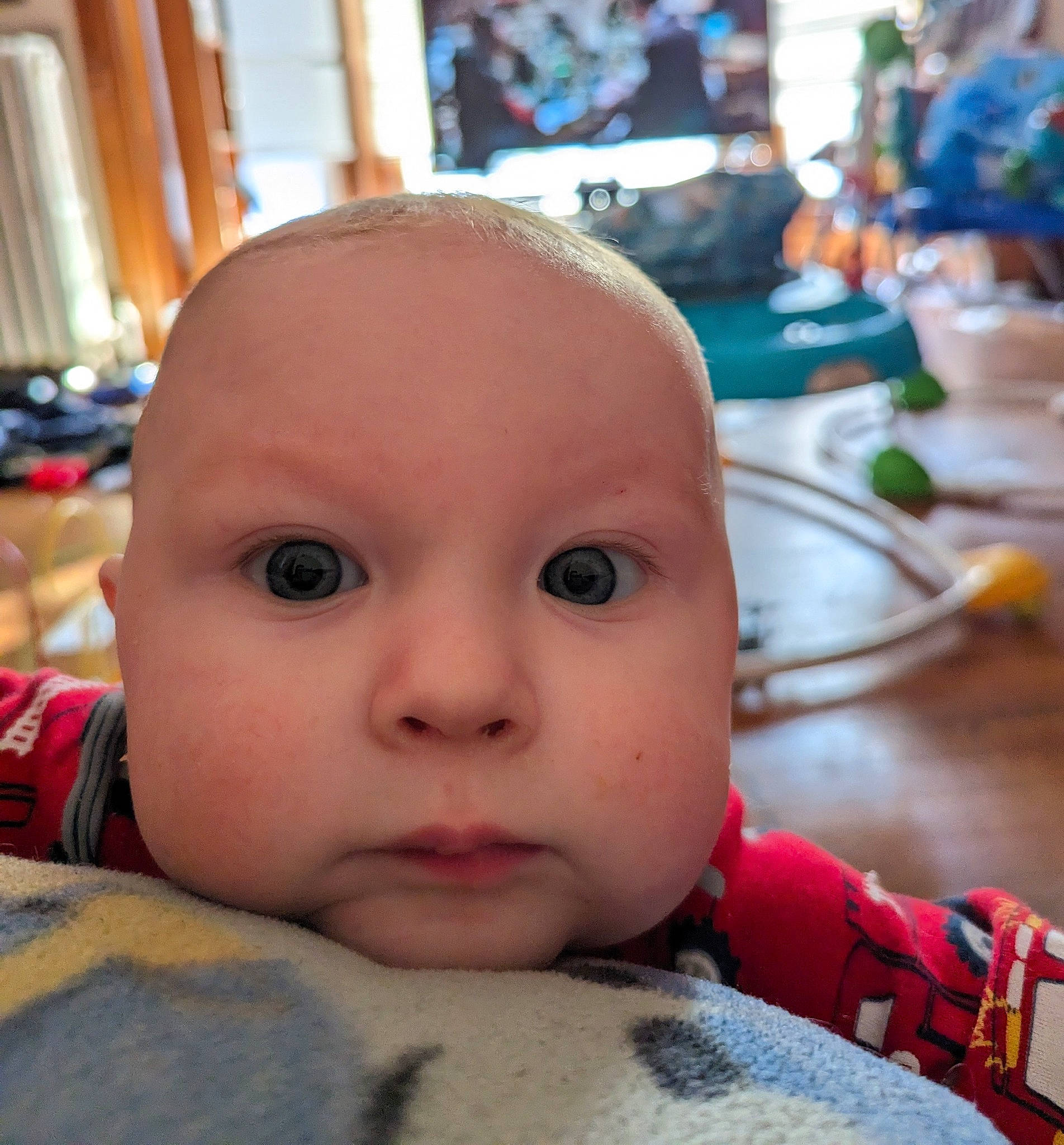Connor is registered to the contest to win money with this photo: baby, cheek, child, chin, eyebrow, eyelash, finger, forehead, fun, happy, iris, lip, mouth, nose, person, selfie, sitting, skin, thumb, toddler