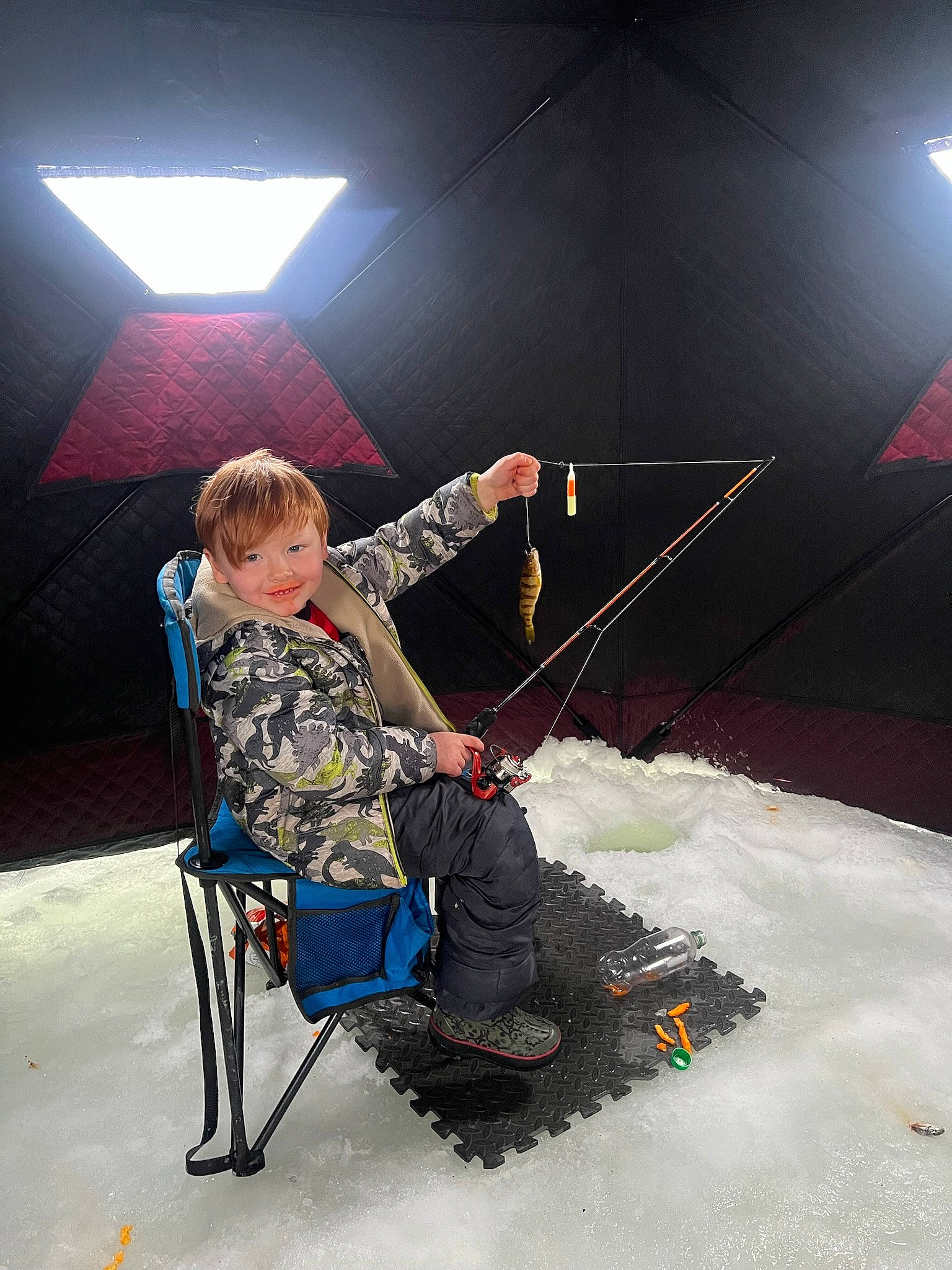 Marcus is registered to the contest to win money with this photo: adventure, chair, darkness, entertainment, extreme_sport, flash_photography, fun, joy, leisure, lens_flare, person, recreation, rope, sitting, slope, snow, sports_equipment, toy, tree, winter