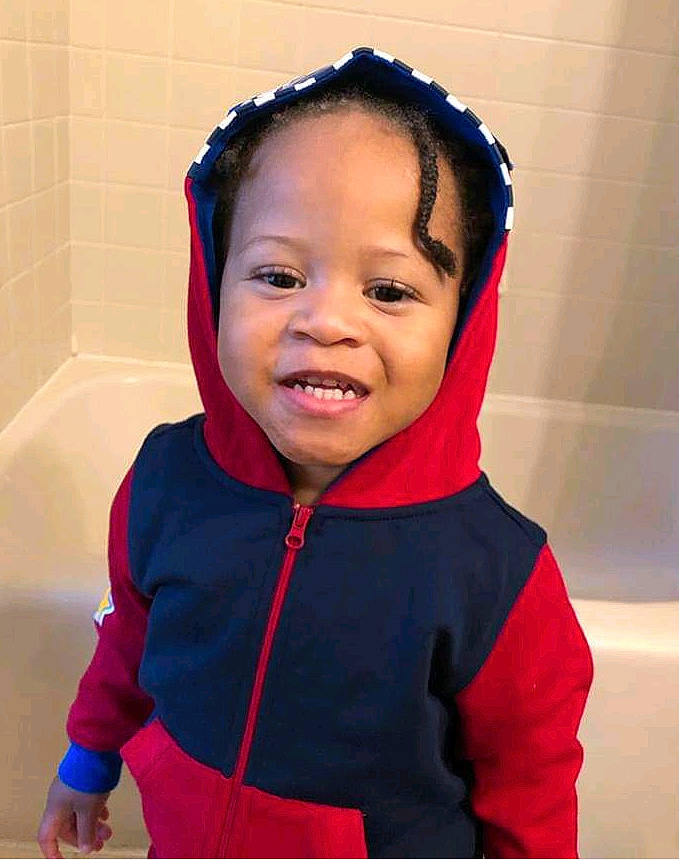 Franklin is registered to the contest to win money with this photo: boy, child, day, ear, face, facial_expression, fun, girl, head, neck, organ, outerwear, person, product, red, skin, smile, toddler