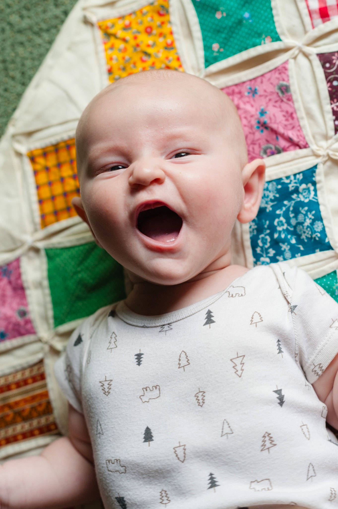 Finn joined the competition — help win amazing prizes! baby, baby_laughing, baby_toddler_clothing, cheek, child, chin, fun, happy, linens, lip, mouth, nose, pattern, person, pink, product, skin, sleeve, smile, textile