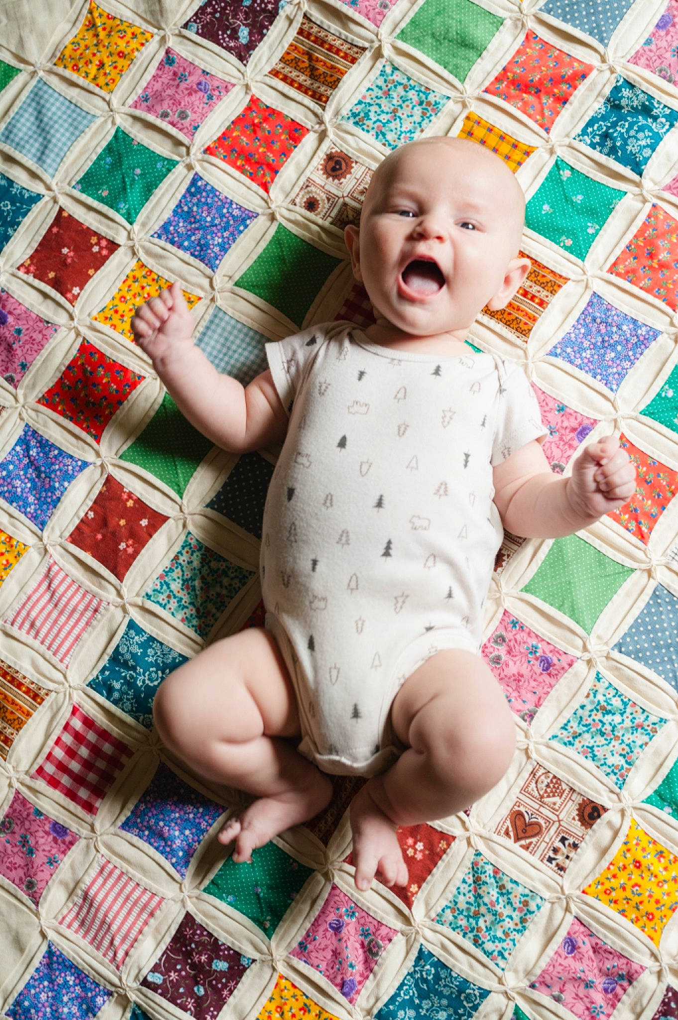 Finn is registered to the contest to win money with this photo: baby, baby_products, baby_safety, baby_toddler_clothing, child, dress, finger, flooring, foot, green, hand, happy, linens, nail, pattern, person, play, sleeve, smile, textile