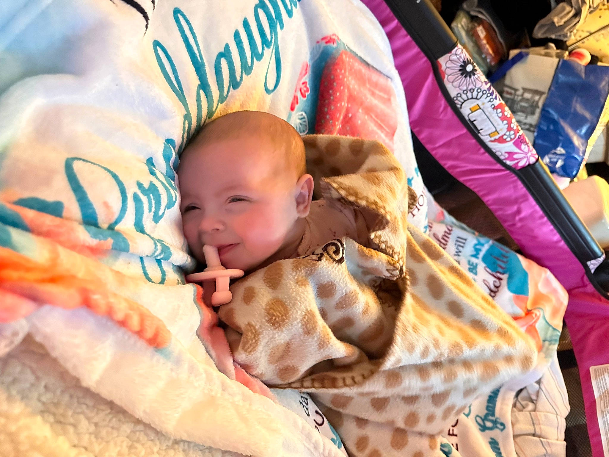 Melody is registered to the contest to win money with this photo: baby, baby_products, baby_toddler_clothing, child, event, fun, fur, happy, leisure, linens, nap_mat, pattern, people, person, smile, toddler, vacation