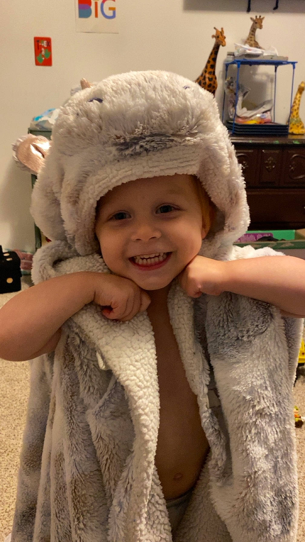Cameron joined the competition — help win amazing prizes! beanie, cap, chest_of_drawers, child, fashion_accessory, fun, fur, hair_accessory, happy, headwear, human_body, iris, joy, knit_cap, knitting, person, skin, smile, television, textile