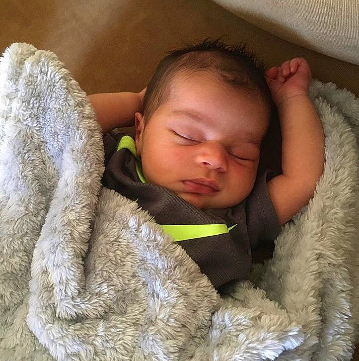 Armoni is registered to the contest to win money with this photo: baby, baby_sleeping, bedtime, blanket, child, comfort, ear, fur, linens, nap, nose, person, skin, sleep, textile, toddler, wool