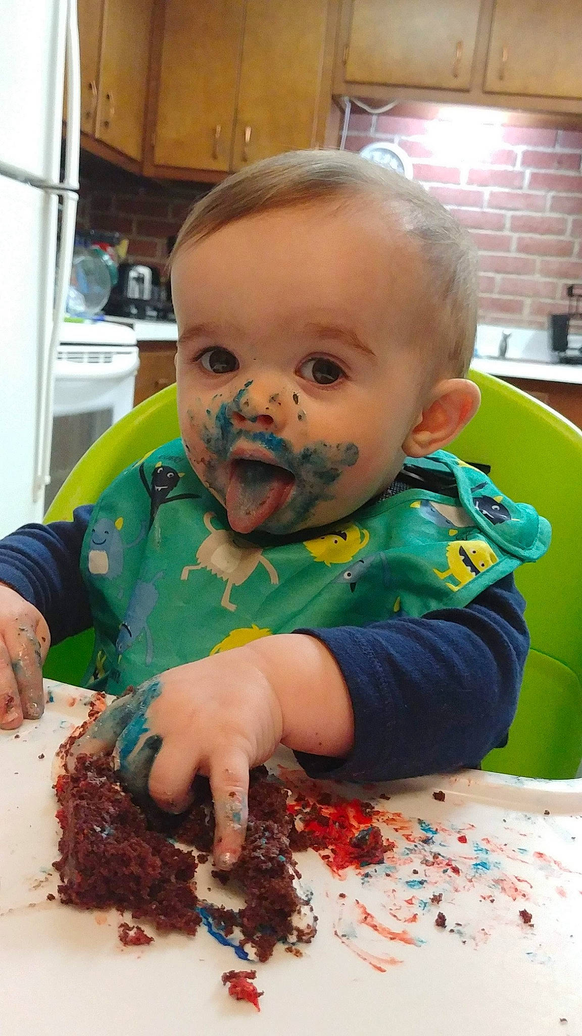 Gannon is registered to the contest to win money with this photo: birthday, cake, child, chocolate_cake, cuisine, dessert, eating, food, party, person, toddler
