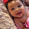Denver joined the competition — help win amazing prizes! baby, child, smiling, face, headband, flower, pink, blanket, soft, skin, cute, happy, portrait, infant, closeup, indoors, person, newborn, toddler, expression