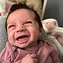 Gracelynn joined the competition — help win amazing prizes! baby, blanket, closeup, clothing, cozy, cushion, cute, face, fist, hair, hand, happy, indoor, infant, onesie, person, pink, portrait, skin, smile