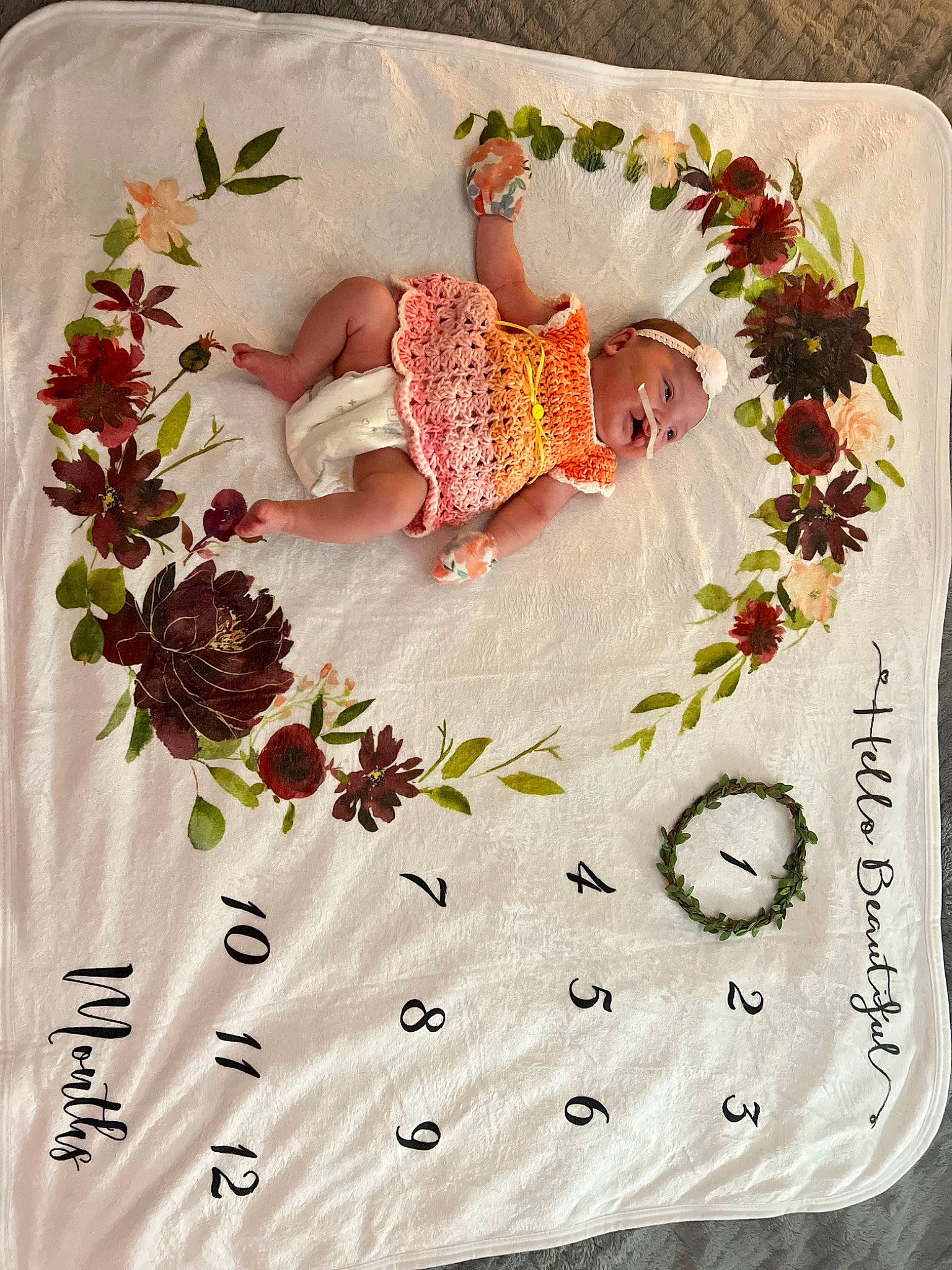 Harmony is registered to the contest to win money with this photo: art, baby, baby_toddler_clothing, bedding, comfort, design, dishware, floral_design, flower, font, illustration, linens, needlework, pattern, pedicel, person, petal, product, room, textile