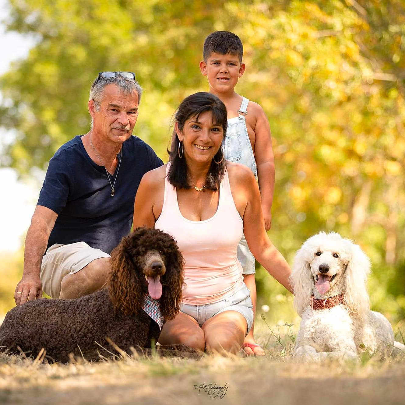 Kaly Et Bella participe au concours pour gagner de l'argent avec cette photo : accessories, adult, animal, boy, canine, child, dog, face, female, grass, head, male, man, people, person, pet, photography, plant, portrait, woman