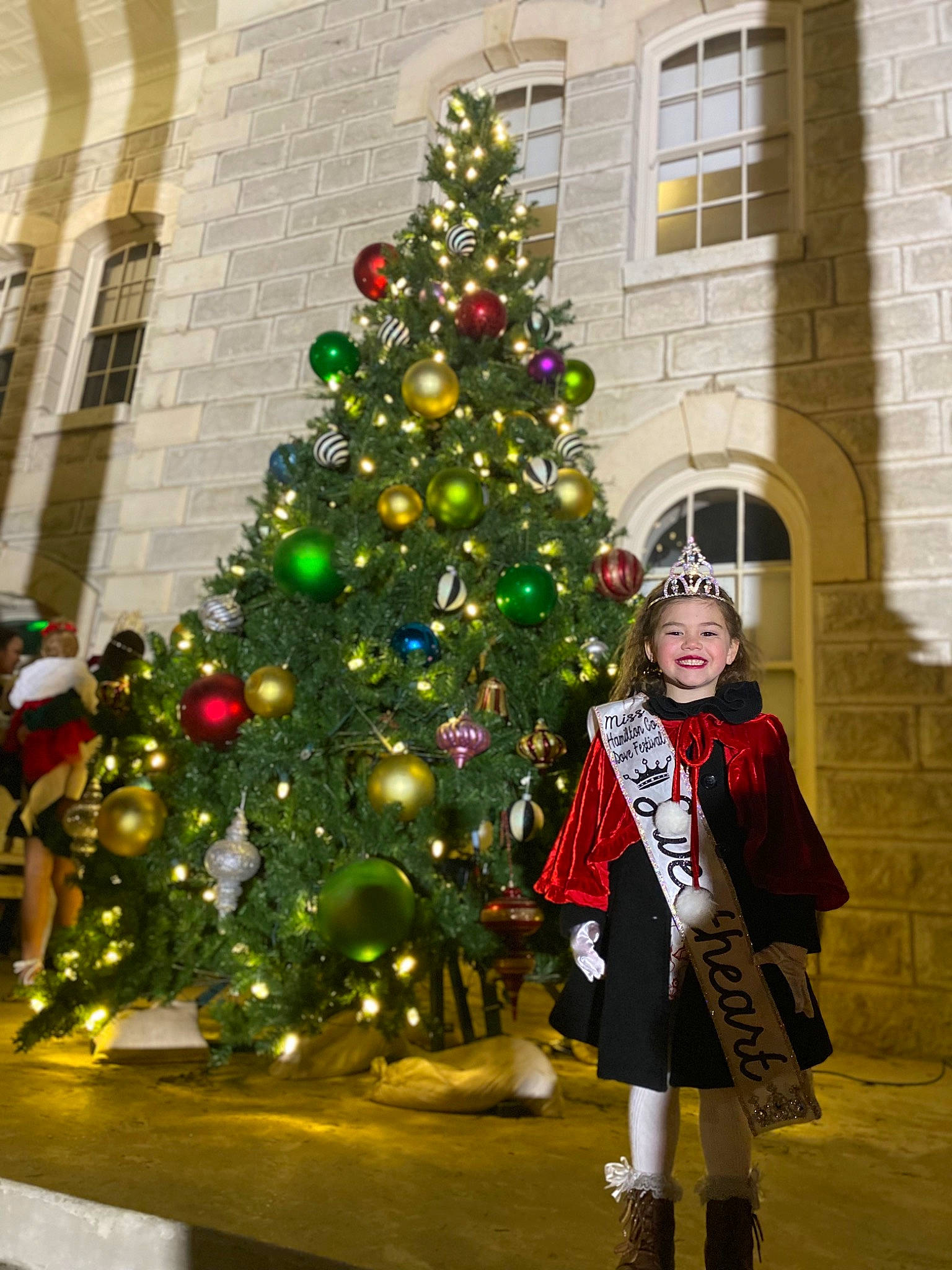 Tesla joined the competition — help win amazing prizes! building, christmas, christmas_decoration, christmas_ornament, christmas_tree, city, conifer, event, evergreen, fun, holiday, holiday_ornament, interior_design, joy, larch, ornament, person, smile, tradition, tree