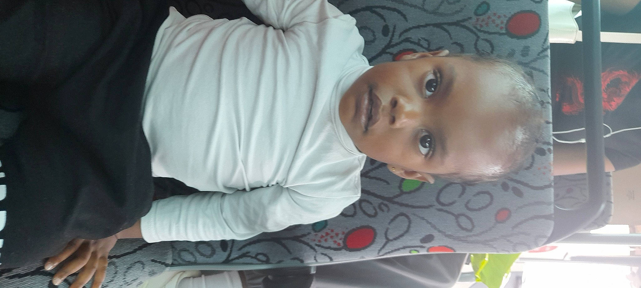 Tyrese a rejoint le concours — aidez-le/la à gagner de superbes lots ! cheek, child, comfort, elbow, eyebrow, eyelash, forehead, fun, hat, linens, lip, mouth, nose, person, plant, room, skin, sleeve, smile, toddler