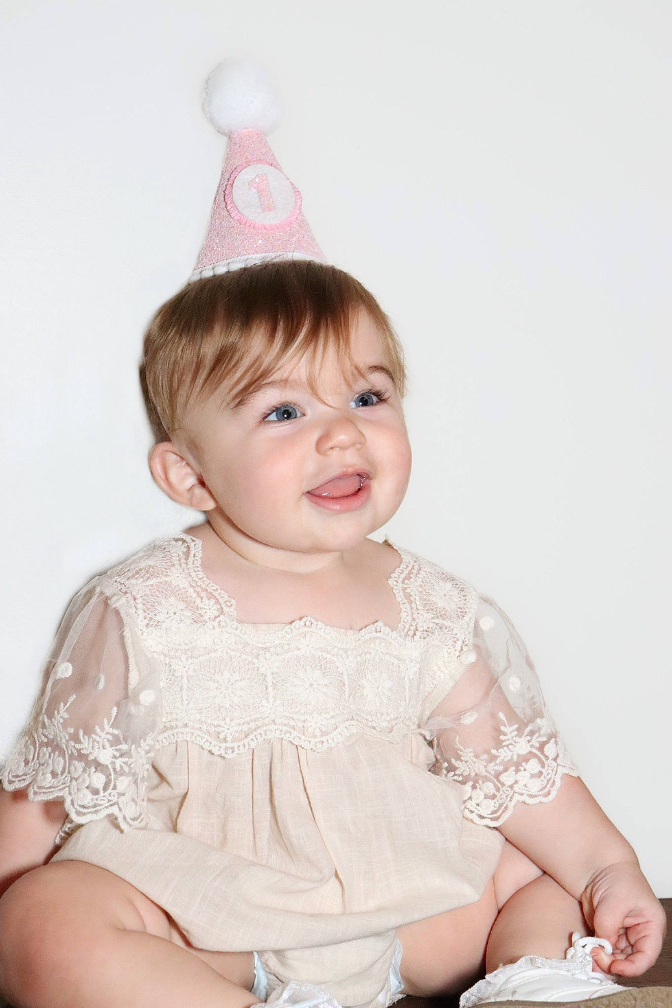 Emberly joined the competition — help win amazing prizes! baby, baby_toddler_clothing, child, embellishment, event, facial_expression, fashion_accessory, flash_photography, happy, headpiece, jewellery, joy, pattern, peach, person, pink, portrait_photography, sitting, skin, sleeve