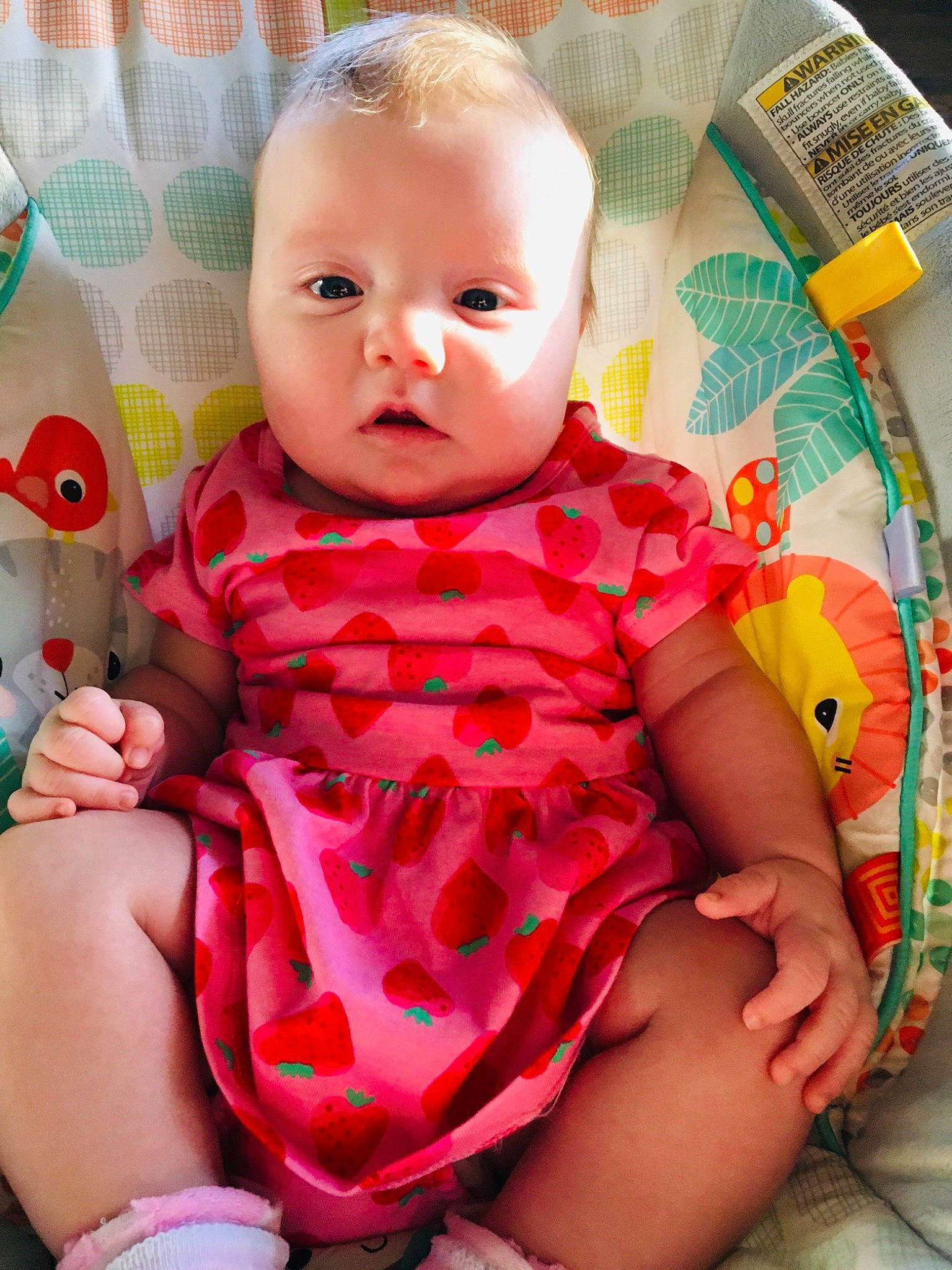 Shia is registered to the contest to win money with this photo: baby, baby_products, baby_toddler_clothing, cheek, child, comfort, happy, head, iris, lip, magenta, neck, pattern, person, pink, product, sitting, skin, sleeve, thigh