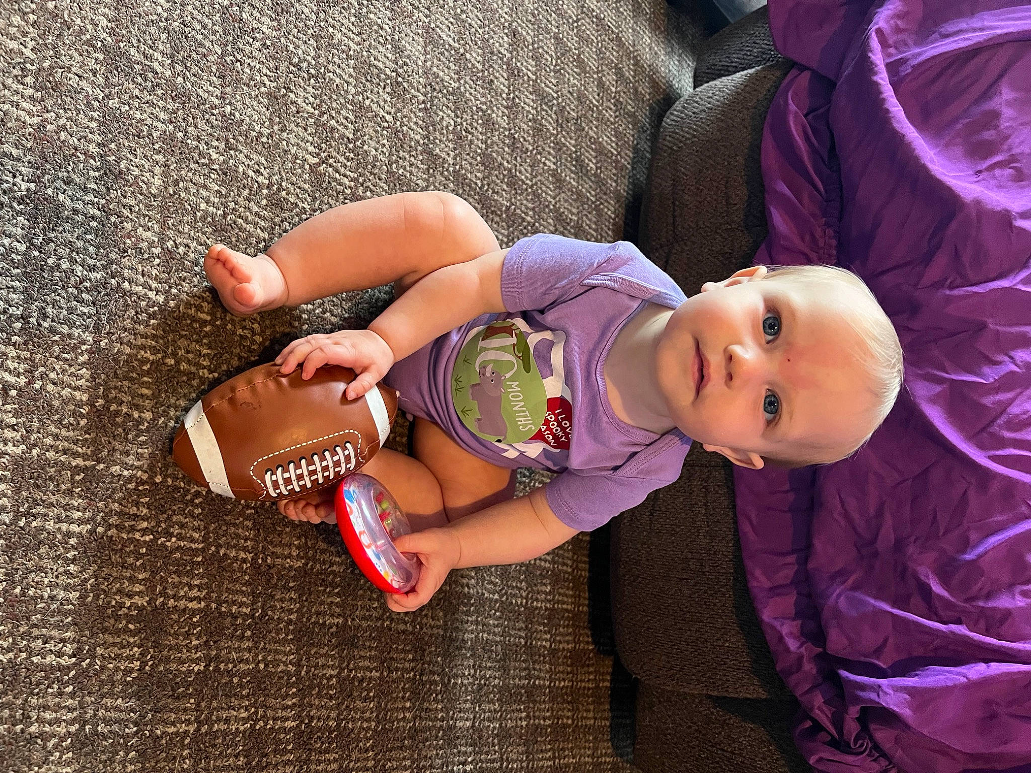 Macii joined the competition — help win amazing prizes! arm, baby, baby_toddler_clothing, dress, finger, foot, hand, happy, human_body, human_leg, joint, leg, person, product, purple, sandal, skin, textile, thigh, toddler