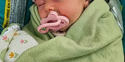 Estelle is registered to the contest to win money with this photo: adorable, baby, blanket, car_seat, child, closeup, cozy, cute, infant, knit, newborn, pacifier, peaceful, pink_hat, portrait, resting, sleeping, soft, warm, wrapped