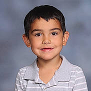 Christopher is registered to the contest to win money with this photo: child, boy, portrait, smile, missing_tooth, casual_clothing, striped_shirt, short_hair, studio_background, innocent, happy, cute, young, person, headshot, face, eyebrows, eyes, skin, collar
