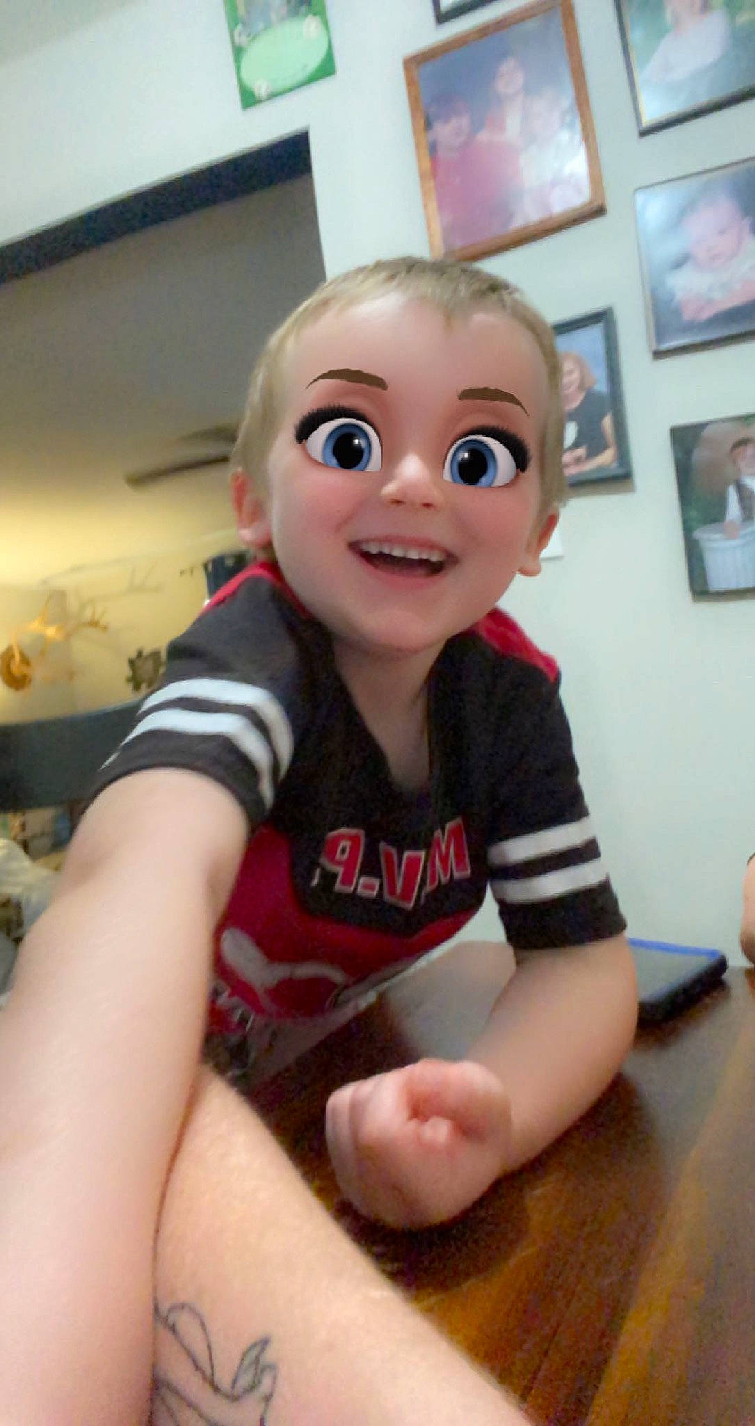 Rhydian joined the competition — help win amazing prizes! art, baby_toddler_clothing, blurred, carmine, cheek, child, chin, flooring, fun, happy, human_leg, nose, person, picture_frame, sitting, skin, sleeve, smile, t_shirt, thigh