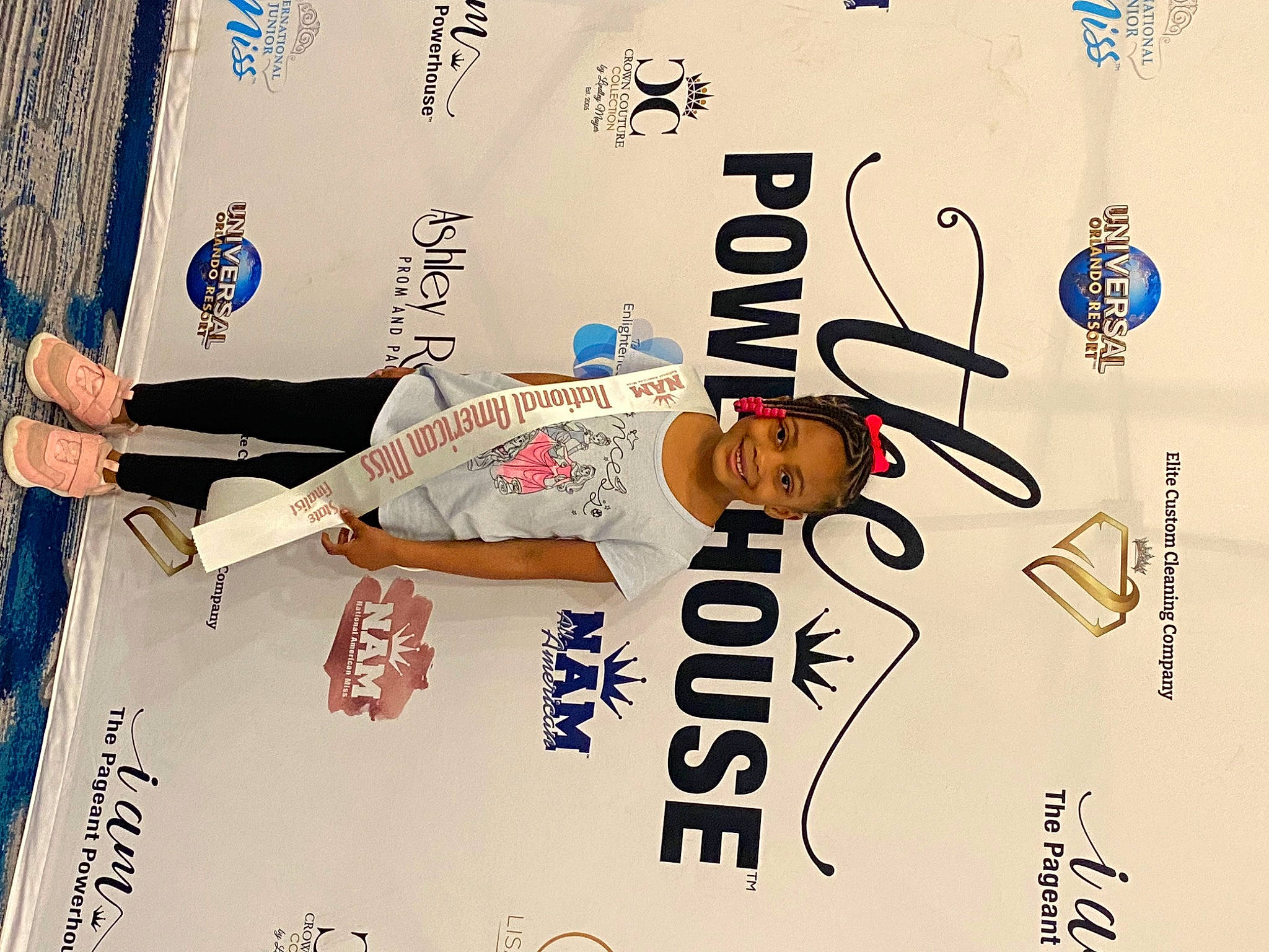 Calanie joined the competition — help win amazing prizes! advertising, brand, circle, elbow, font, gesture, graphics, hat, joy, logo, number, person, sleeve, t_shirt, thumb, wrist