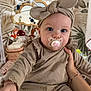 Judith participe au concours pour gagner de l'argent avec cette photo : baby, infant, pacifier, headband, hand, nursery, mobile, wallpaper, pattern, clothing, cute, indoor, portrait, child, person, room, soft, bracelet, holding, expression