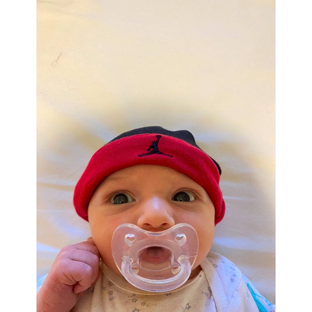Angelo joined the competition — help win amazing prizes! baby, cap, cheek, chin, eye, eyelash, face, gesture, happy, head, headwear, helmet, jaw, lip, mouth, neck, nose, outerwear, person, sleeve