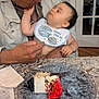 Wyatt joined the competition — help win amazing prizes! affection, baby, bib, cake, celebration, child, countertop, door, face, food, hand, indoor, interaction, kitchen, man, older_adult, person, plate, sprinkles, table